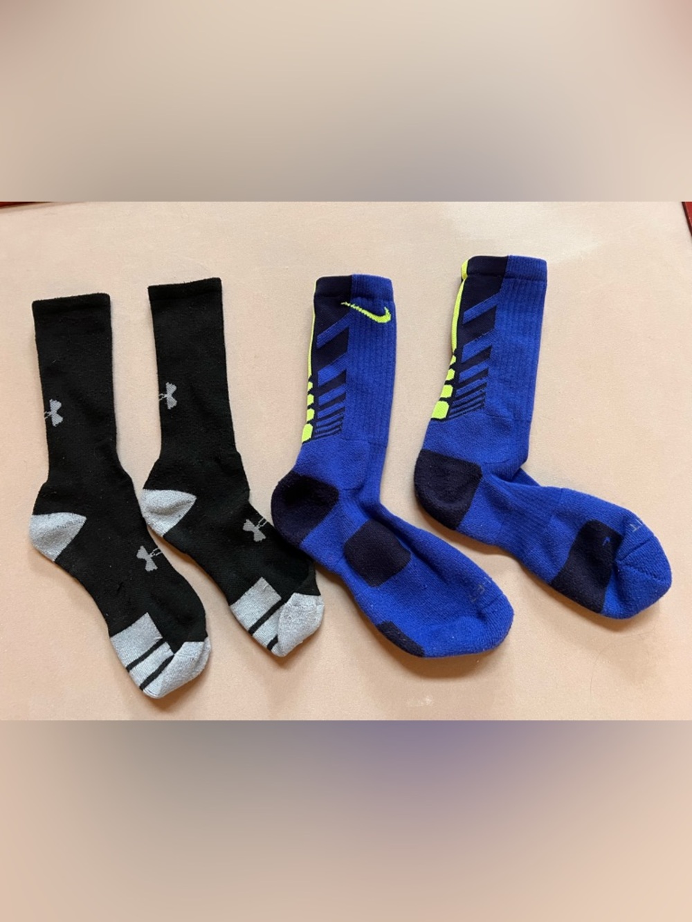 Nike Blue and Under Armor Black Athletic socks